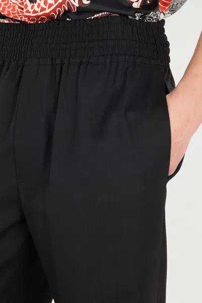 Roberto Cavalli Elasticated-waist Virgin-wool Trousers In Black