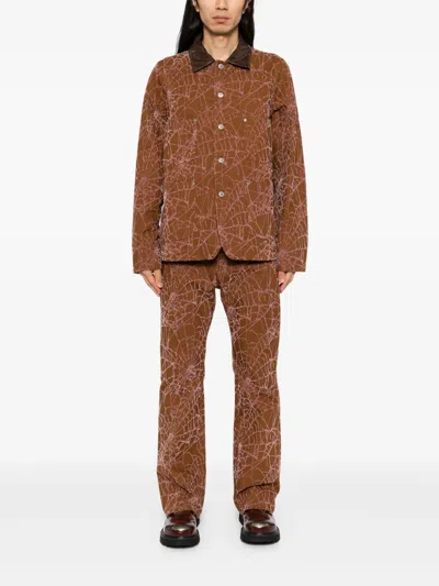 Masu Flocky Web Flare Pants In Brown