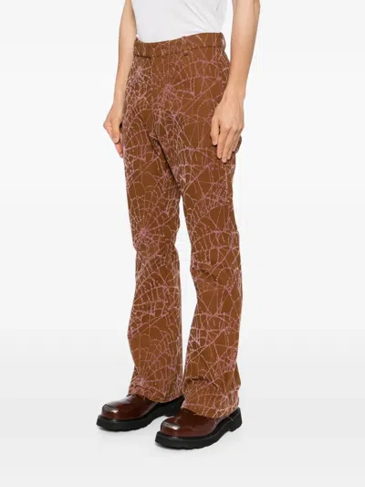 Masu Flocky Web Flare Pants In Brown
