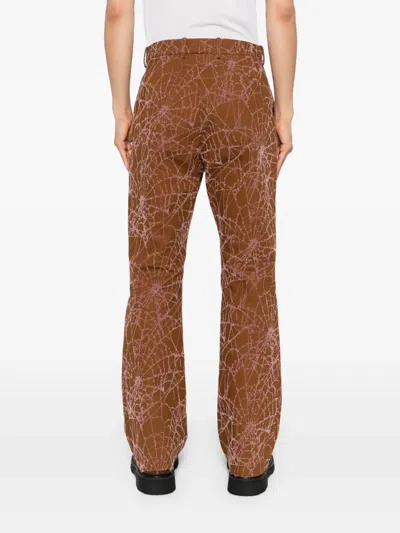 Masu Flocky Web Flare Pants In Brown