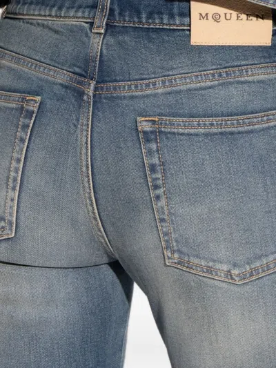 Alexander Mcqueen Stonewashed Denim Peplum Jacket In Blue