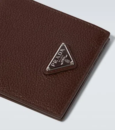 Prada Logo Bi-fold Leather Wallet In Brown