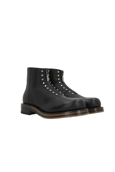 Alexander Mcqueen Chunky Sole Round Toe Studded Ankle Boots In Black