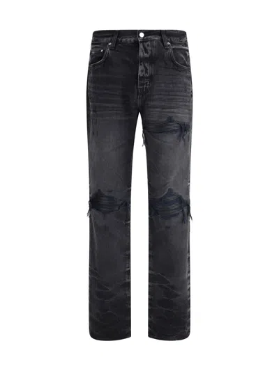 Amiri Distressed Denim Trousers With Faded Detailing