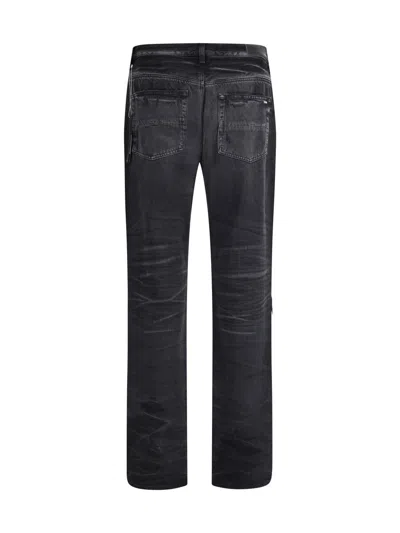 Amiri Distressed Denim Trousers With Faded Detailing