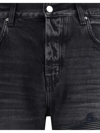 Amiri Distressed Denim Trousers With Faded Detailing