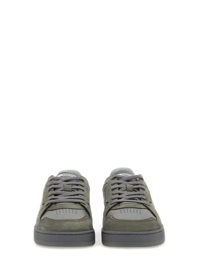 Axel Arigato Sneaker "says It" In Gray