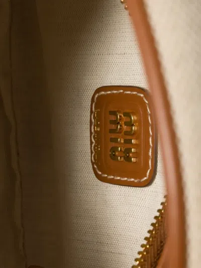 Miu Miu Wander Canvas And Leather Bag In Neutral