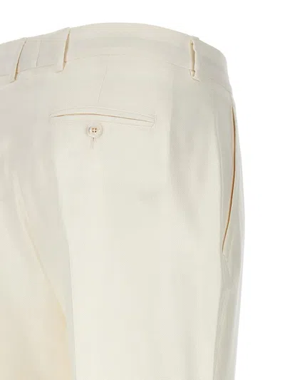 Kiton Slim Fit Trousers Featuring Front Pleats In White