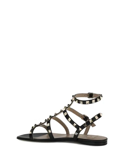Valentino Garavani Rockstud Ankle-strap Flat Sandals In Black