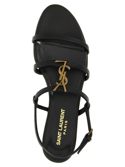 Saint Laurent Cassandre Leather Sandals In Black