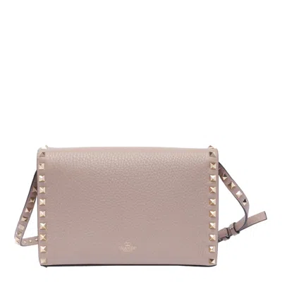 Valentino Garavani Valentino Rockstud Small Grainy Leather Crossbody In Pink