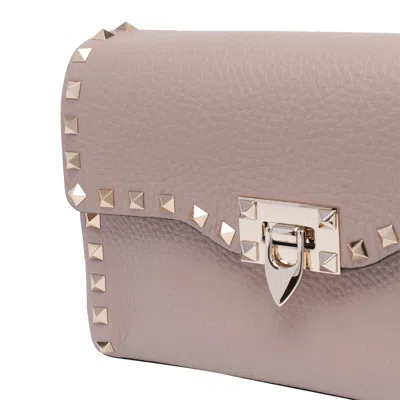Valentino Garavani Valentino Rockstud Small Grainy Leather Crossbody In Pink