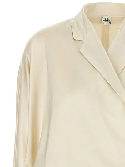 Totême Womens Ecru Wrap Notch-lapels Woven Blouse In Neutral