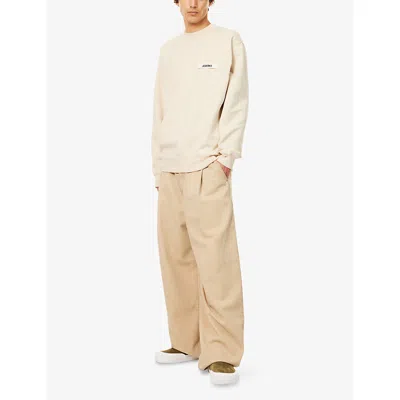 Jacquemus Long-sleeve Off-white Cotton T-shirt With Subtle Logo Patch In Neutral