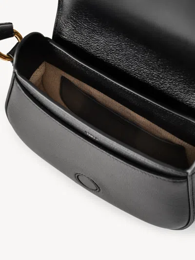 Chloé Grained Leather Shoulder Bag With Prominent Logo Detail In Black