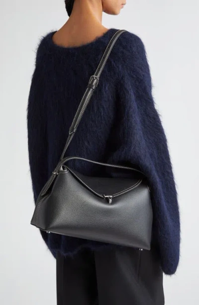 Totême Structured Black Leather Shoulder Bag With Flap Closure