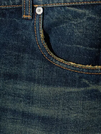 Alexander Mcqueen Wide Leg Faded Jeans In Blue