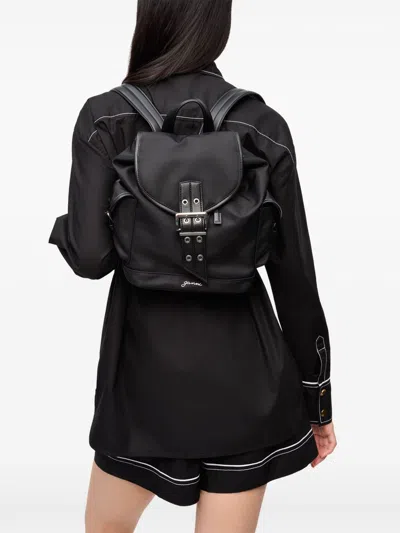 Ganni Magnetic Pockets Flap Backpack Handle In Black