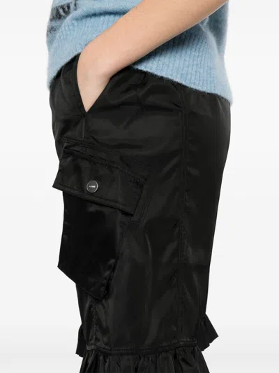 Ganni Flap Pocket Ruffle Hem Shorts In Black