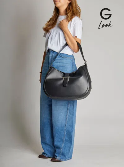 Alexander Mcqueen Black Shoulder Bag With Adjustable Shoulder Strap And T Buckle Closure On The Front In Leather Woman