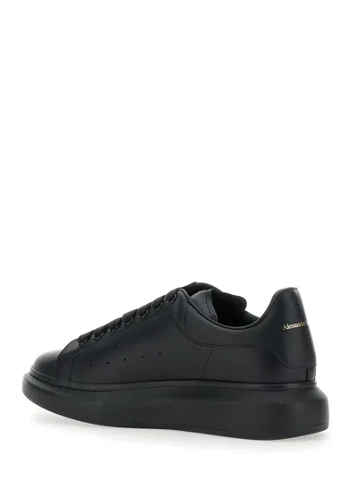 Alexander Mcqueen Black Sneakers With Logo Lettering On The Rear And Oversize Rubber Sole In Leather In Black