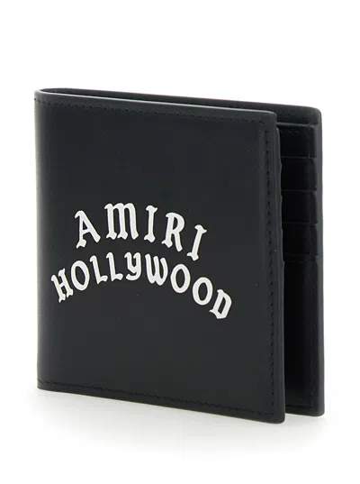 Amiri Bi-fold Wallwt With Logo Lettering On The Front In Leather Man In Black