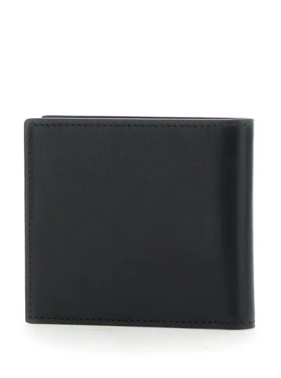 Amiri Bi-fold Wallwt With Logo Lettering On The Front In Leather Man In Black