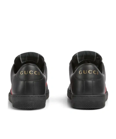 Gucci Gg Embossed Leather Low-top Sneakers In Black