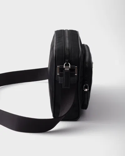 Prada Small Shoulder Bag With Adjustable Strap And Front Zip Pocket In Black