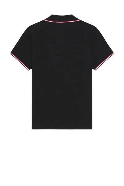 Moncler This Polo Shirt Features A Timeless Design That Transcends The Seasons In Black