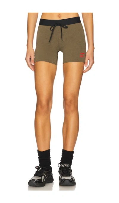 On X The Loop & Pleasures Pace Short Tights In Green