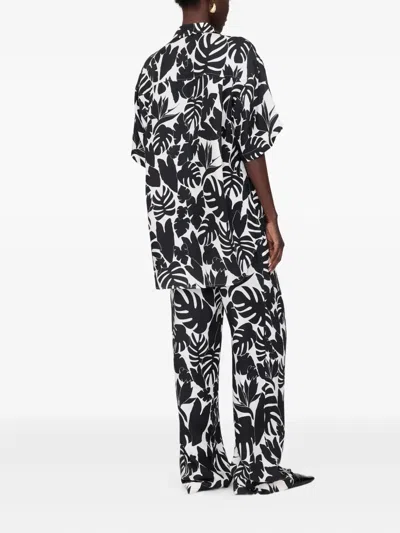 Anine Bing Elain Leaf-print Trousers In Black