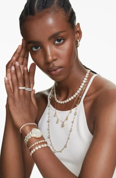 Swarovski Una Angelic Round Cut White Gold-tone Plated Tennis Necklace In Gold