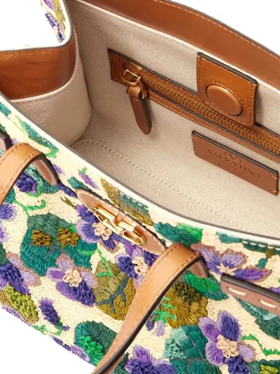 Valentino Garavani Antibes Small Violet Flower Raffia Tote Bag In Natural Multi Camel