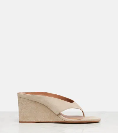 Alaïa Cube 75 Suede Wedge Thong Mules In Neutral