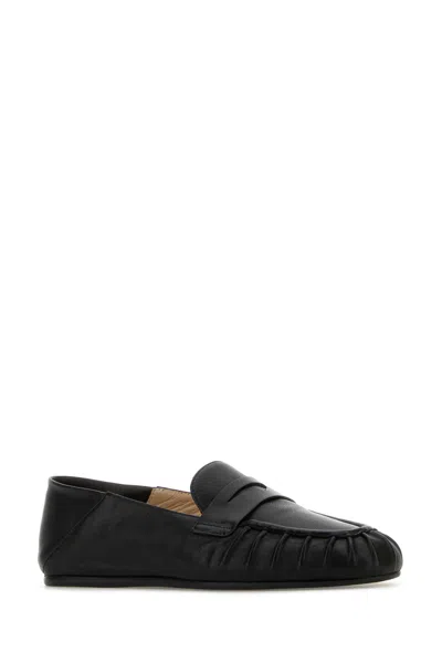 Stuart Weitzman Almond Toe Leather Loafer With Textured Detailing