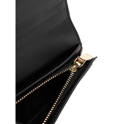 Alexander Mcqueen Logo Snap Button Cardholder Slots In Black
