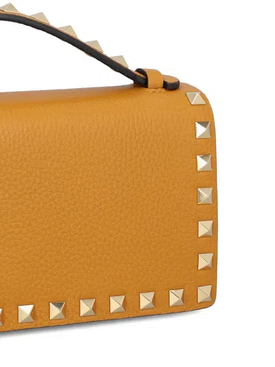 Valentino Rockstud Grainy Leather Wallet On Chain In Yellow