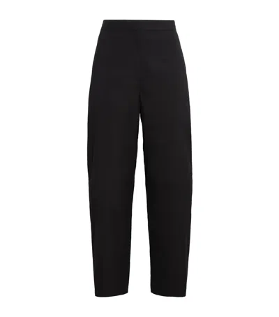 Totême Organic Cotton Twisted Seam Trousers In Black