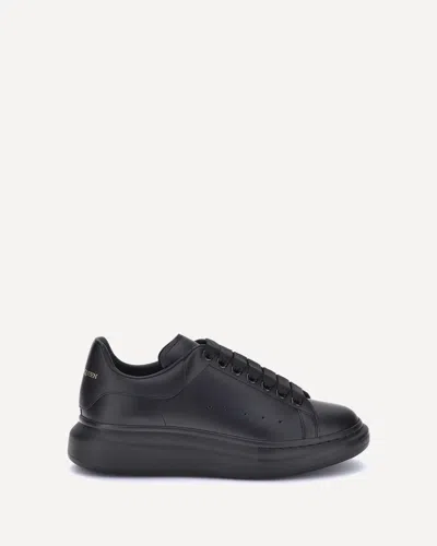 Alexander Mcqueen Black Sneakers With Logo Lettering On The Rear And Oversize Rubber Sole In Leather In Multi