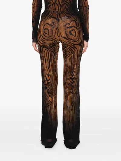 Jean Paul Gaultier Abstract-pattern Print Trousers In Black