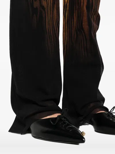 Jean Paul Gaultier Abstract-pattern Print Trousers In Black