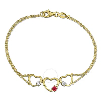 Created Forever 1/6ct Tgw Created Ruby And 1/7ct Tw Lab-grown Diamond Triple Heart Bracelet In Yello In Gold