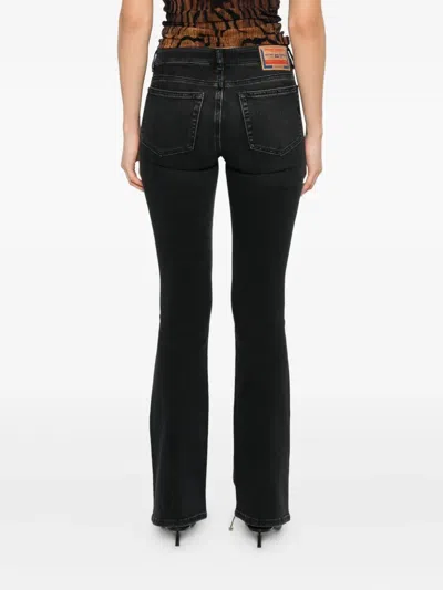 Diesel Flared Cotton Blend Jeans In Black