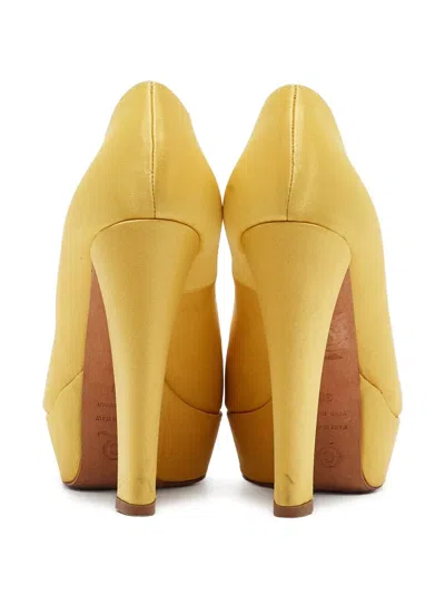 Pre-owned Alexander Mcqueen Leather Heeled Pumps In Yellow