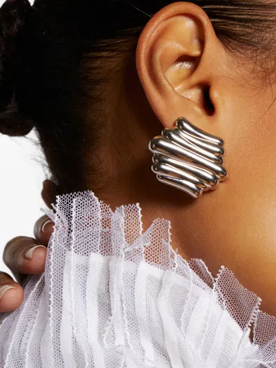 Khaite Crema Earrings In Metallic