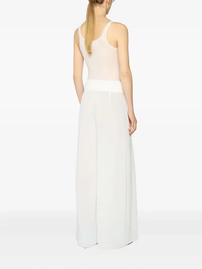 Genny Pleated Wide-leg Trousers In White