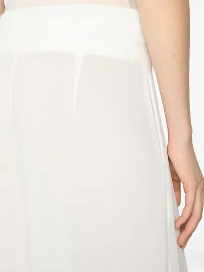 Genny Pleated Wide-leg Trousers In White