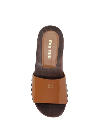 Miu Miu Patent Leather Clogs